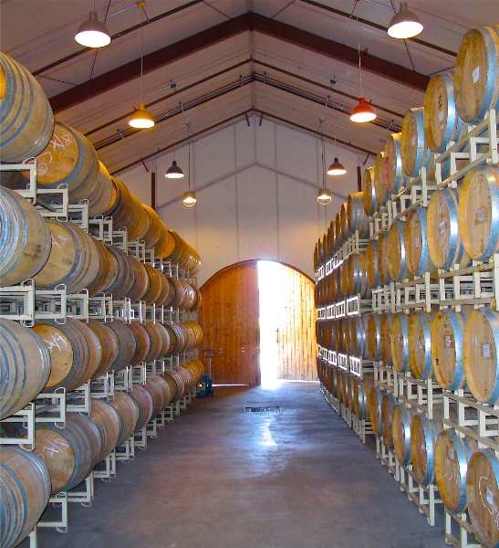 stacked-oak-barrels-inside-tantara